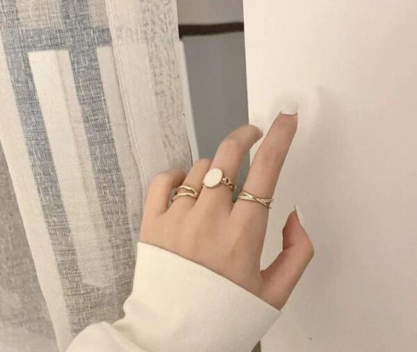 cream three set ring with elegant design