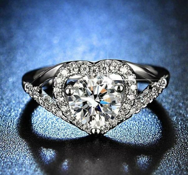 silver heart shape metal ring with smooth finish