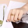 hug style adjustable ring with open embrace design