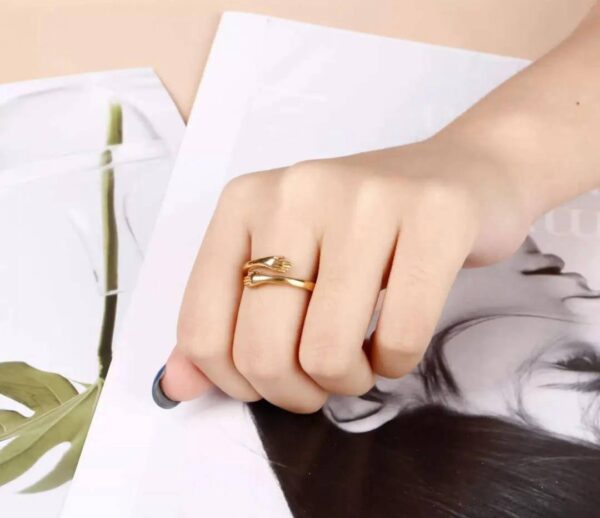 hug style adjustable ring with open embrace design