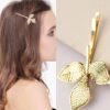 golden alloy korean style leaf hair pin for elegant styling