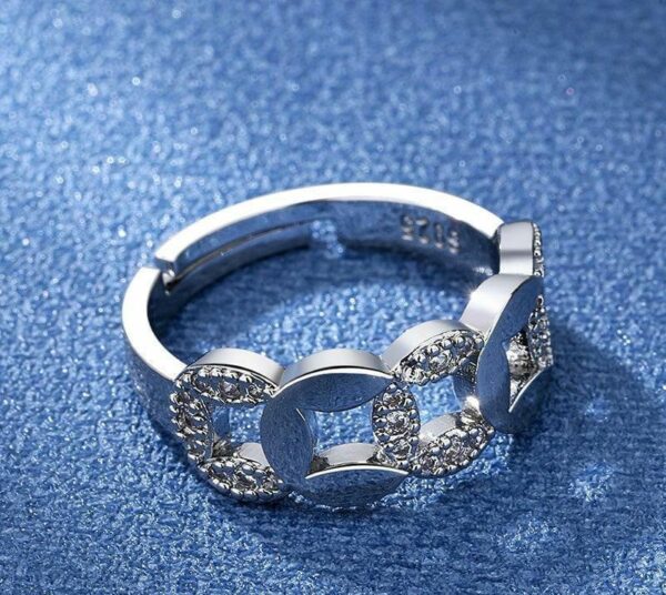 elegant silver plated metal ring with polished finish