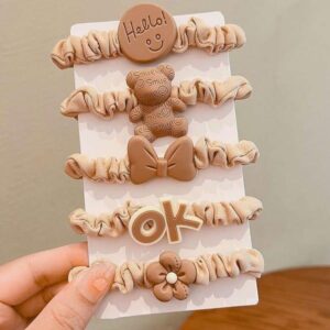 set of 5 brown silicone rubber ponies for secure hold