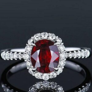 red color stylish oval shaped adjustable ring with bold design