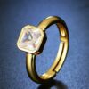 sleek golden plated metal ring with polished finish