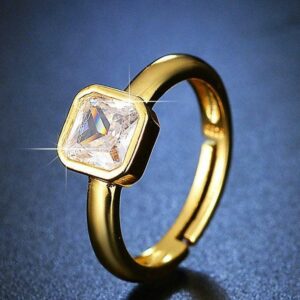sleek golden plated metal ring with polished finish
