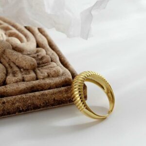 snail style golden metal ring with unique spiral design