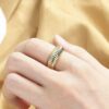 snail style golden metal ring with unique spiral design