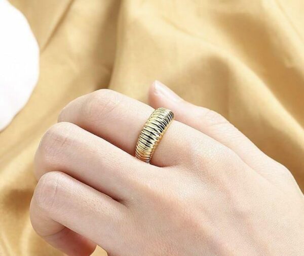 snail style golden metal ring with unique spiral design