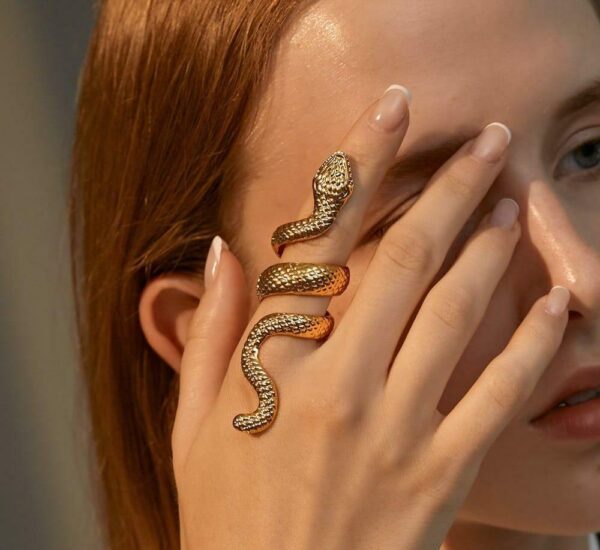 snake style golden plated ring with sleek design