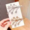 modern gold plated hair pins with silver stones for elegant styling