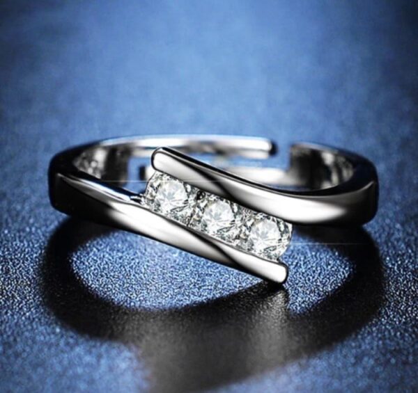 silver adjustable ring with three pulse design
